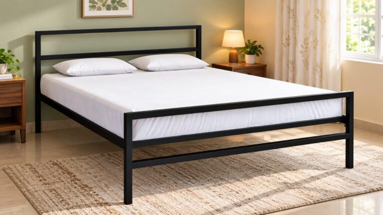 Black metal bed by Tuba Furniture, Pune
