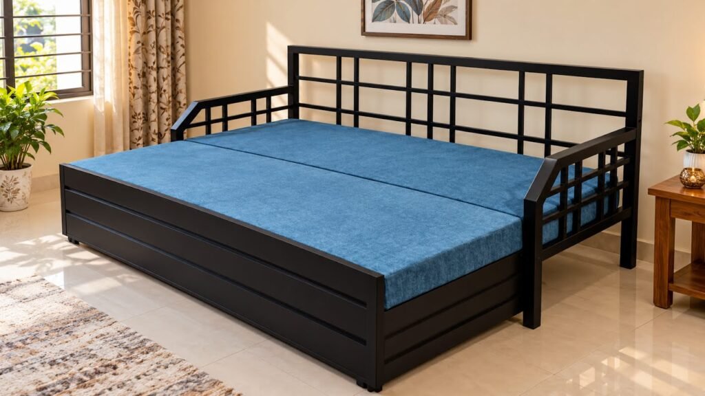 Blue metal sofa cum bed by Tuba Furniture, Pune