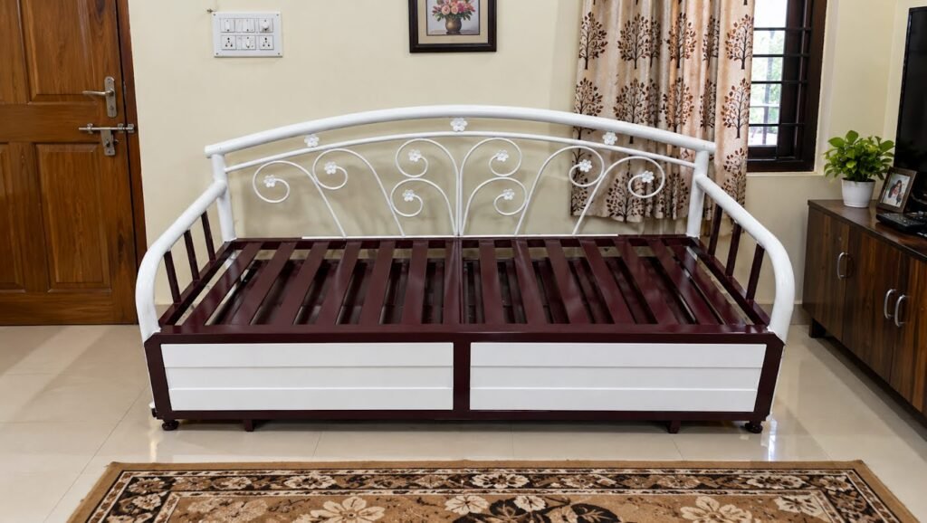 Floral metal sofa cum bed by Tuba Furniture, Pune