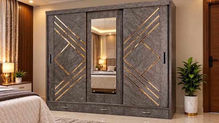Geometric marble finish sliding wardrobe with mirror by Tuba Furniture, Pune