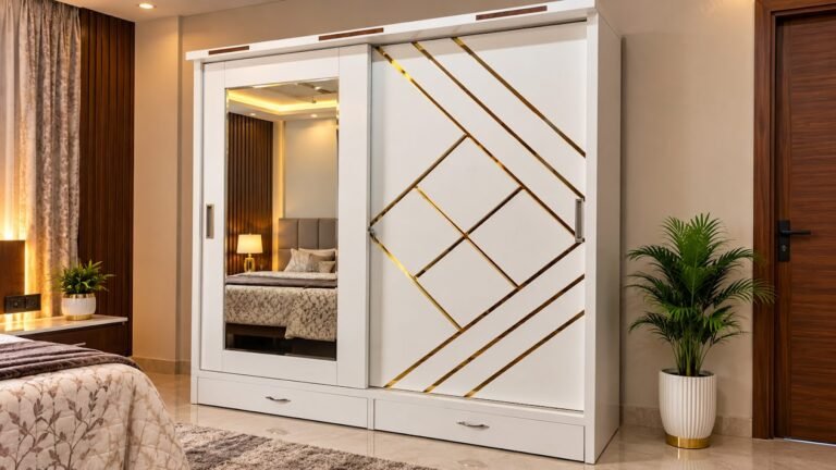 Modern gold-accented wardrobe by Tuba Furniture, Pune