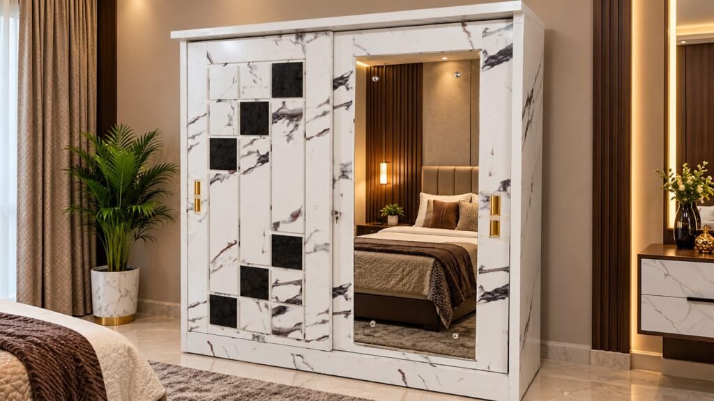 Luxurious marble finish wardrobe by Tuba Furniture, Pune