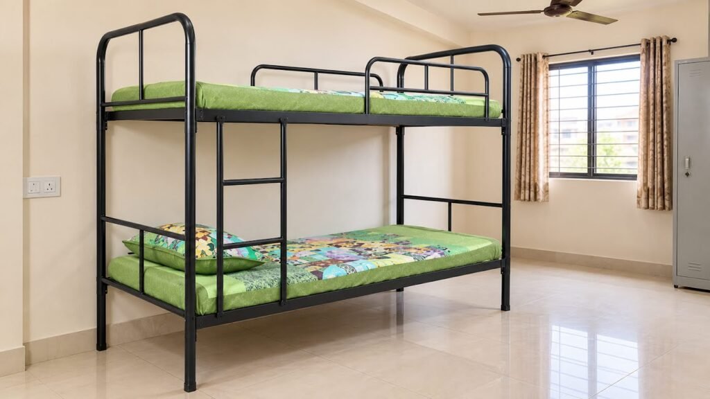 White metal bunk bed for hostel dormitory by Tuba Furniture, Pune