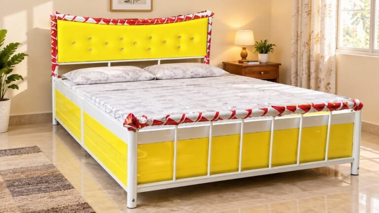 Yellow metal bed by Tuba Furniture, Pune